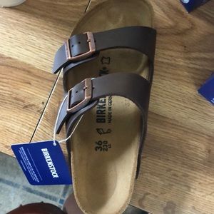 Dark brown Birkenstock’s